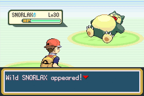 Lotta contro Snorlax in Pokémon Rosso Fuoco, presto trasferibile in Pokémon HOME