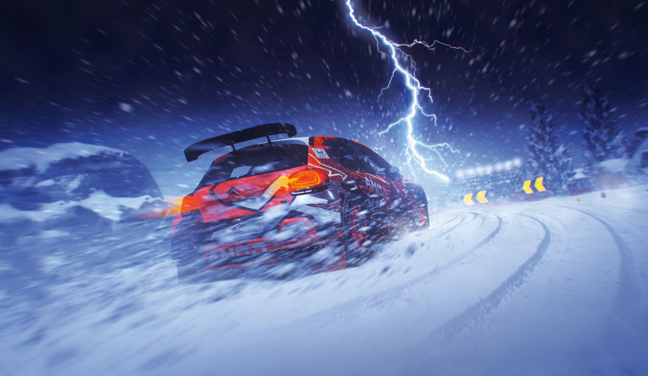 DiRT 5 trofei: un'auto sfreccia sulla neve sotto un temporale
