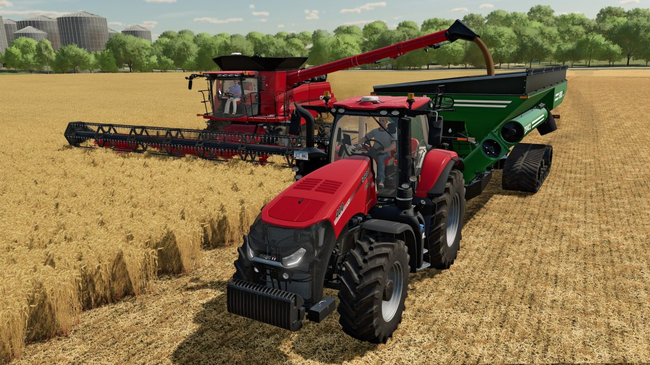 Farming Simulator 22 trofei: mietitrebbia e trattore durante la raccolta del grano