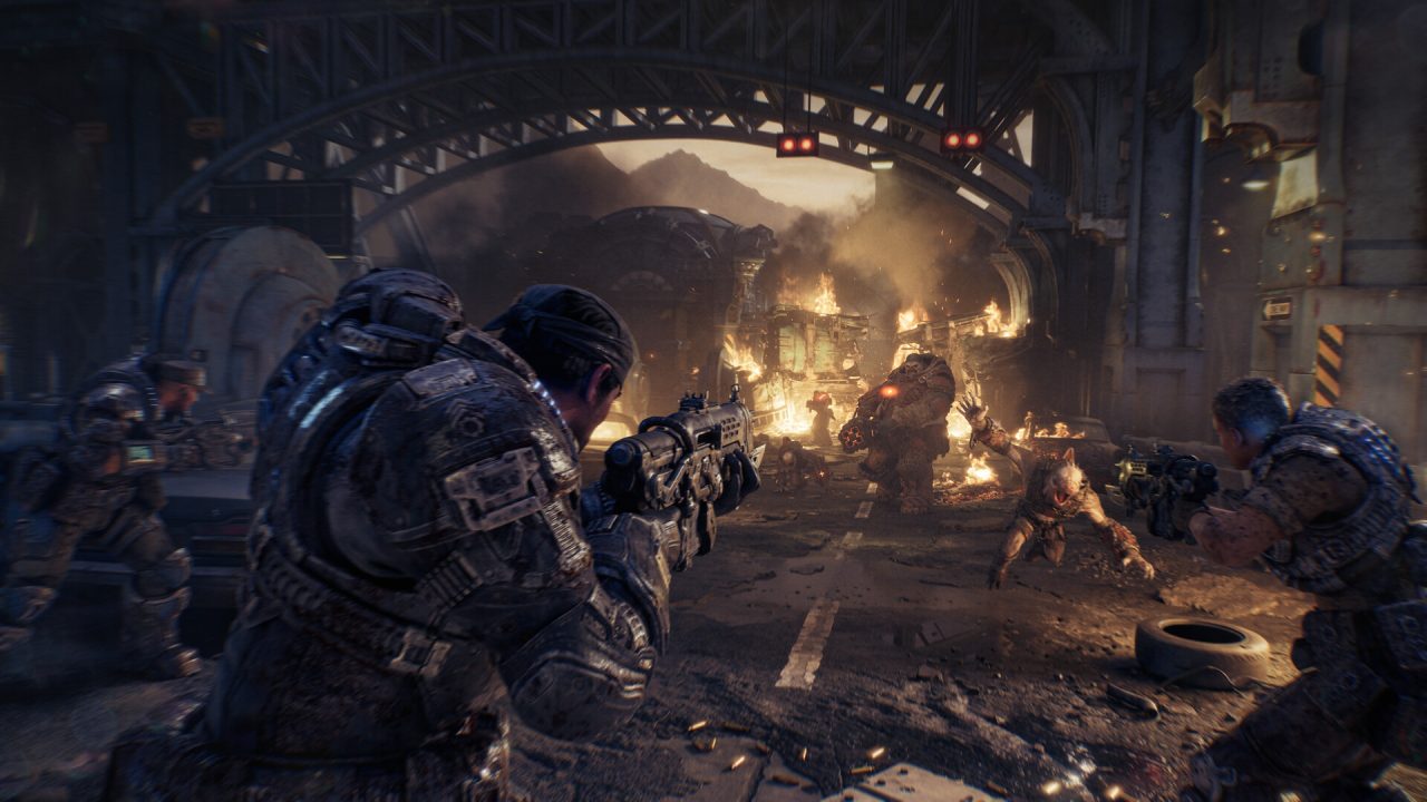 Marcus Fenix e i Gear al riparo durante uno scontro nella campagna di Gears of War: E-Day
