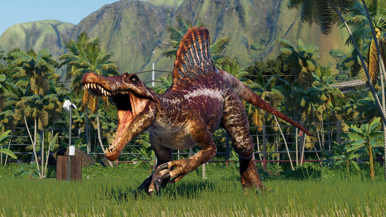 Jurassic World Evolution 2 trofei: uno spinosauro ruggisce nella giungla