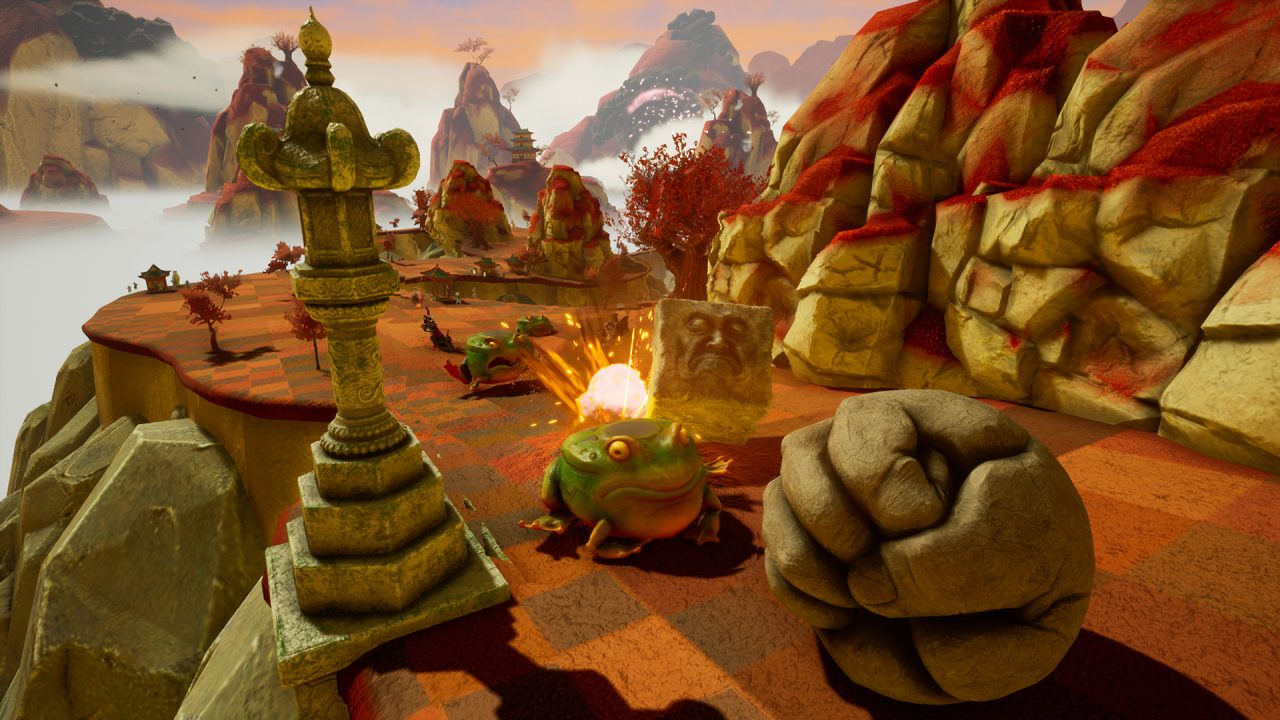 Platino di Rock of Ages 3: una piattaforma di rocce rosse con una rana e un pugno di pietra